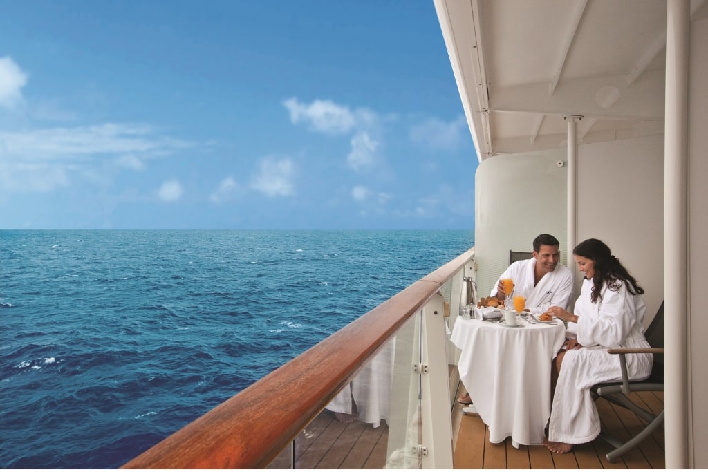 Couple eating on cruise veranda