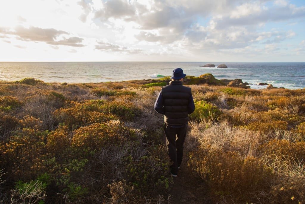 Man trekking in Garrapata State Park